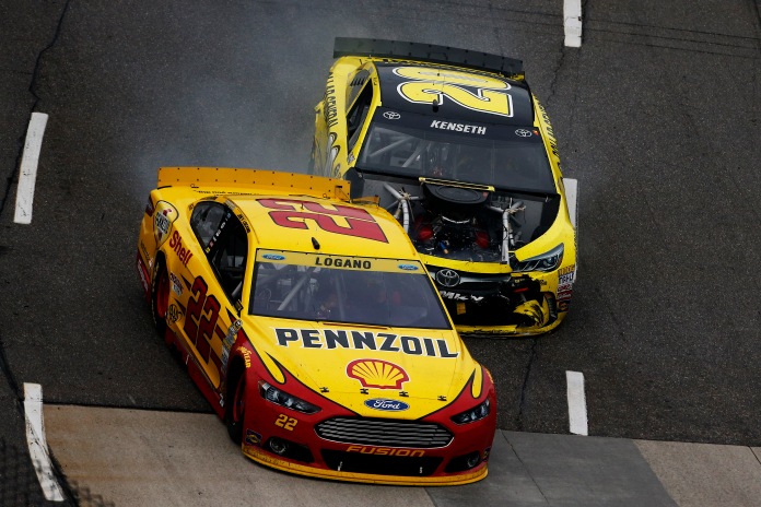 MARTINSVILLE, VA - NOVEMBER 01: Matt Kenseth, driver of the #20 Dollar General Toyota, makes contact with Joey Logano, driver of the #22 Shell Pennzoil Ford, during the NASCAR Sprint Cup Series Goody's Headache Relief Shot 500 at Martinsville Speedway on November 1, 2015 in Martinsville, Virginia. (Photo by Jeff Zelevansky/Getty Images)